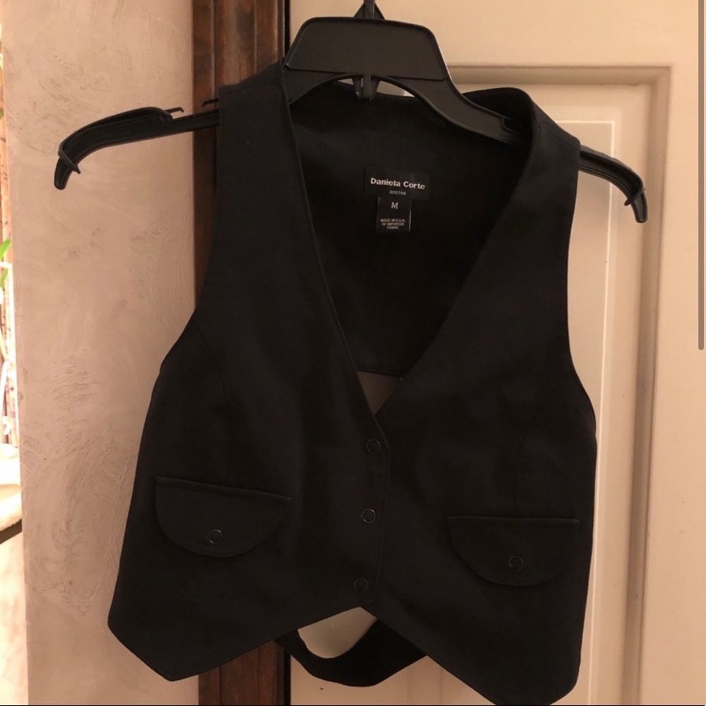 Designer vest, short and fitted. High fashion. Never worn